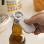 Magnetic Soda Bottle Opener- Sticks to Metal Surfaces, Opens Everything | Compact & Lightweight Design White Kitchen Helper Too - Image 2